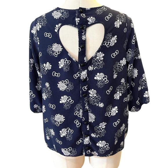 Torrid Hello Kitty Floral & Bow Heart Back Cutout Strappy Pullover Blouse Top 0X - Picture 3 of 3